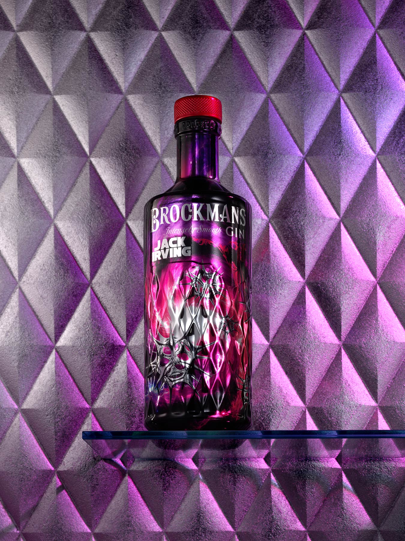 Beautiful drinks photography of Brockmans Gin bottle designed by Jack Irving