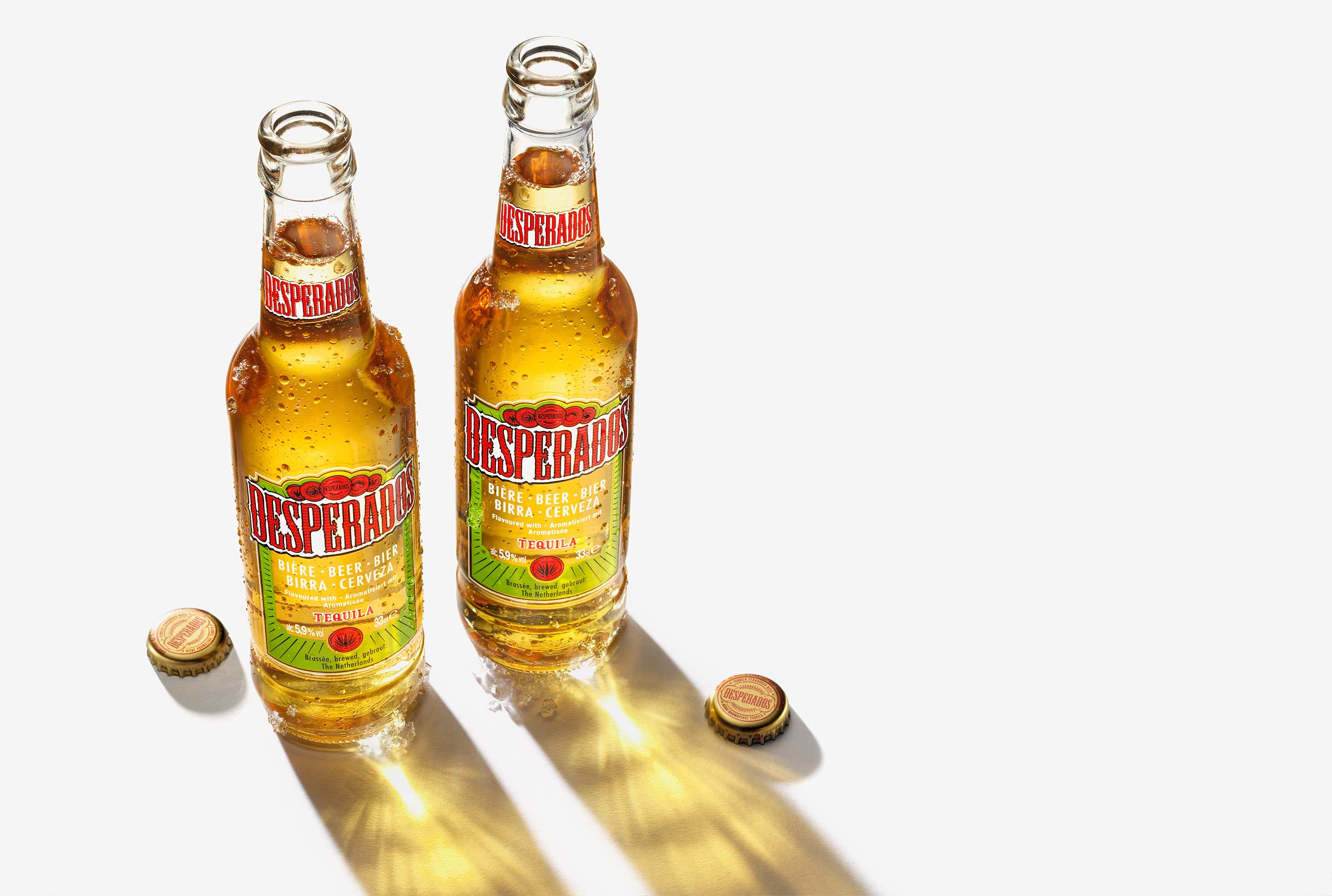 Desperados beer bottles in sunlight by London based drinks photographer Warren Ryley