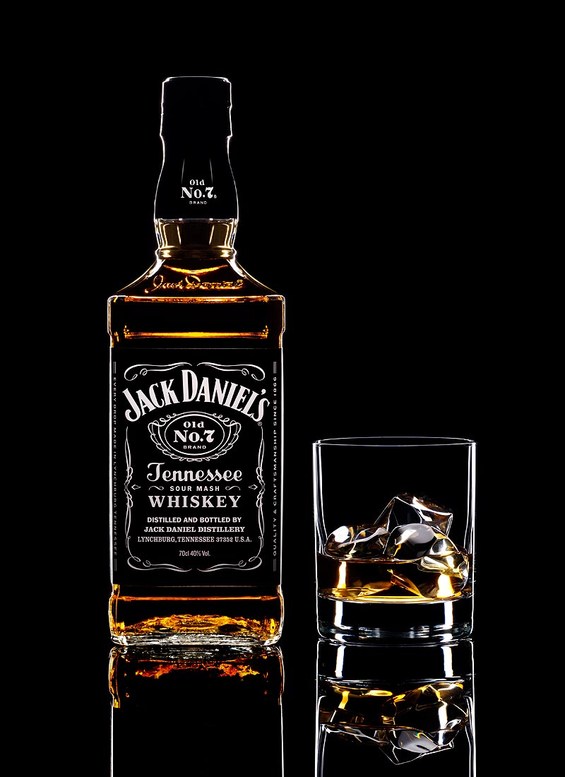 Silhouetted Jack Daniels bottle and serve photographed by London based drinks photographer Warren Ryley