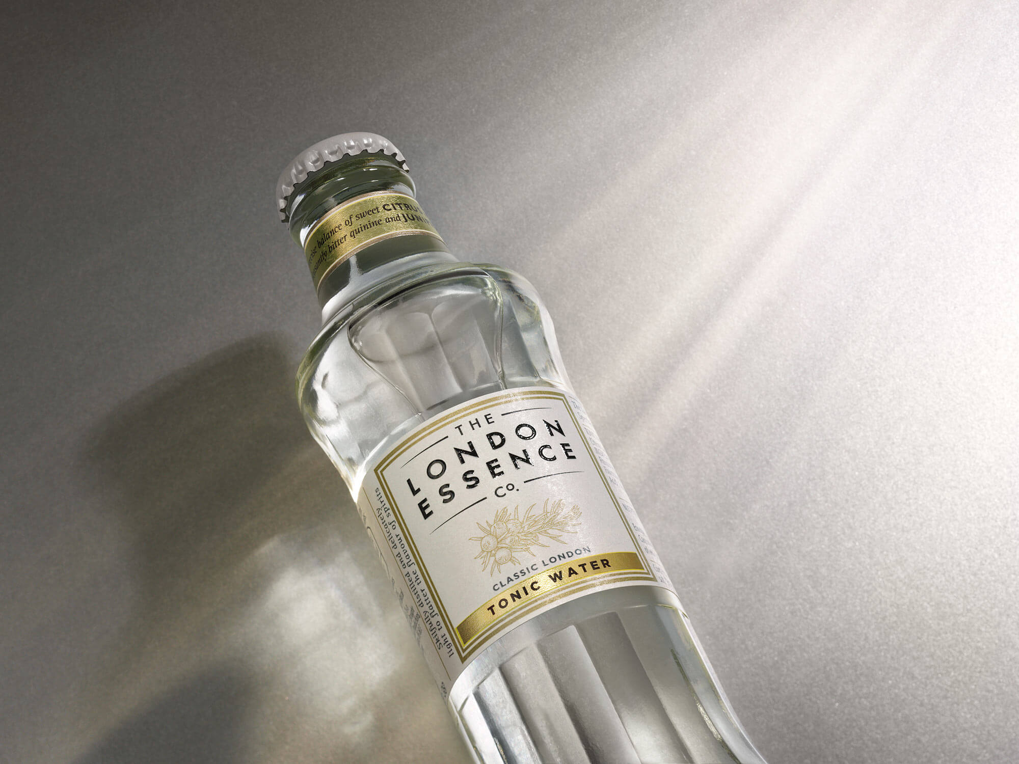 Tonic water bottle with caustic lighting by London based drinks photographer Warren Ryley