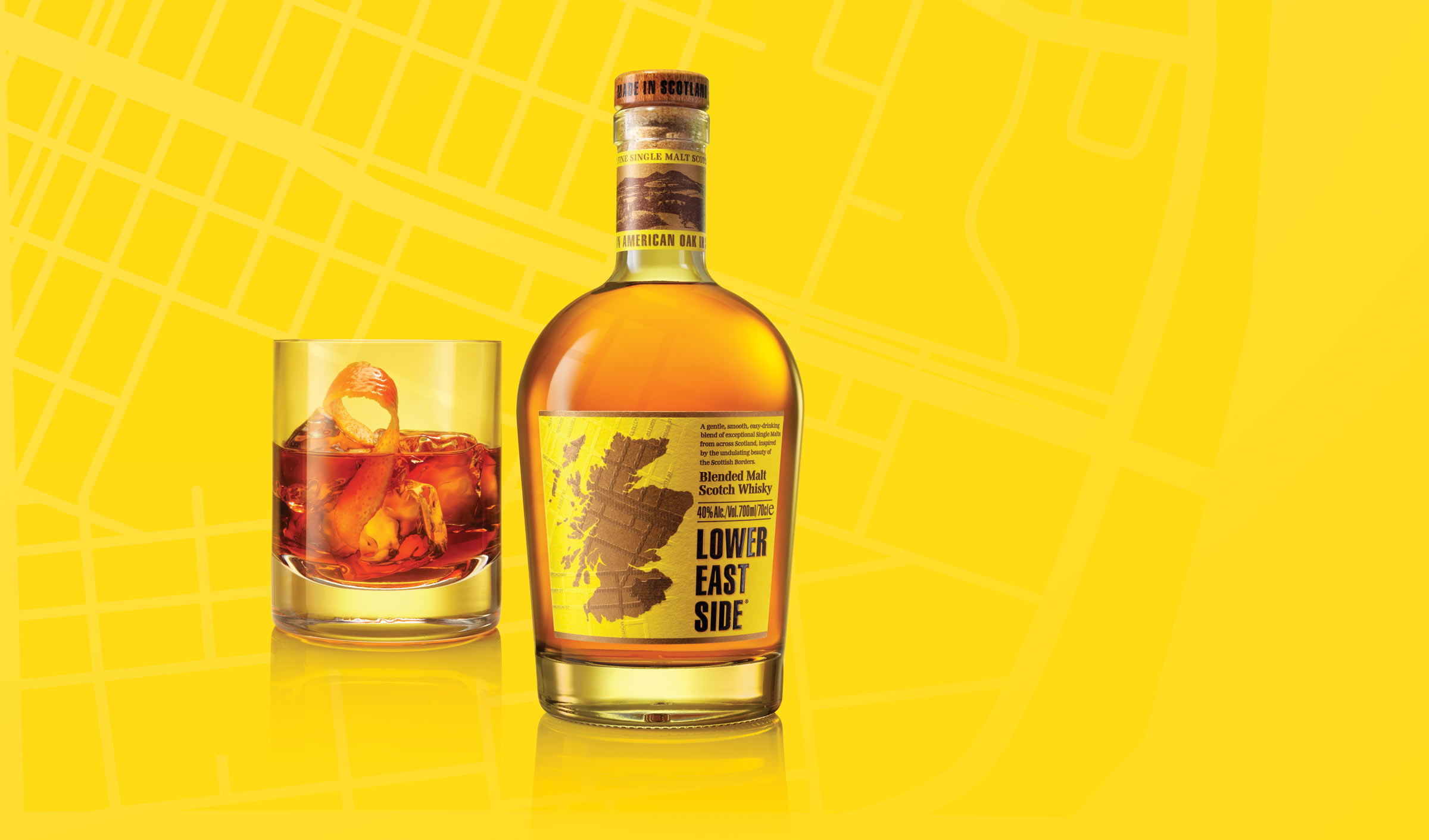 Lower East Side whisky bottle with Old Fashioned cocktail photographed by London drinks photographer Warren Ryley