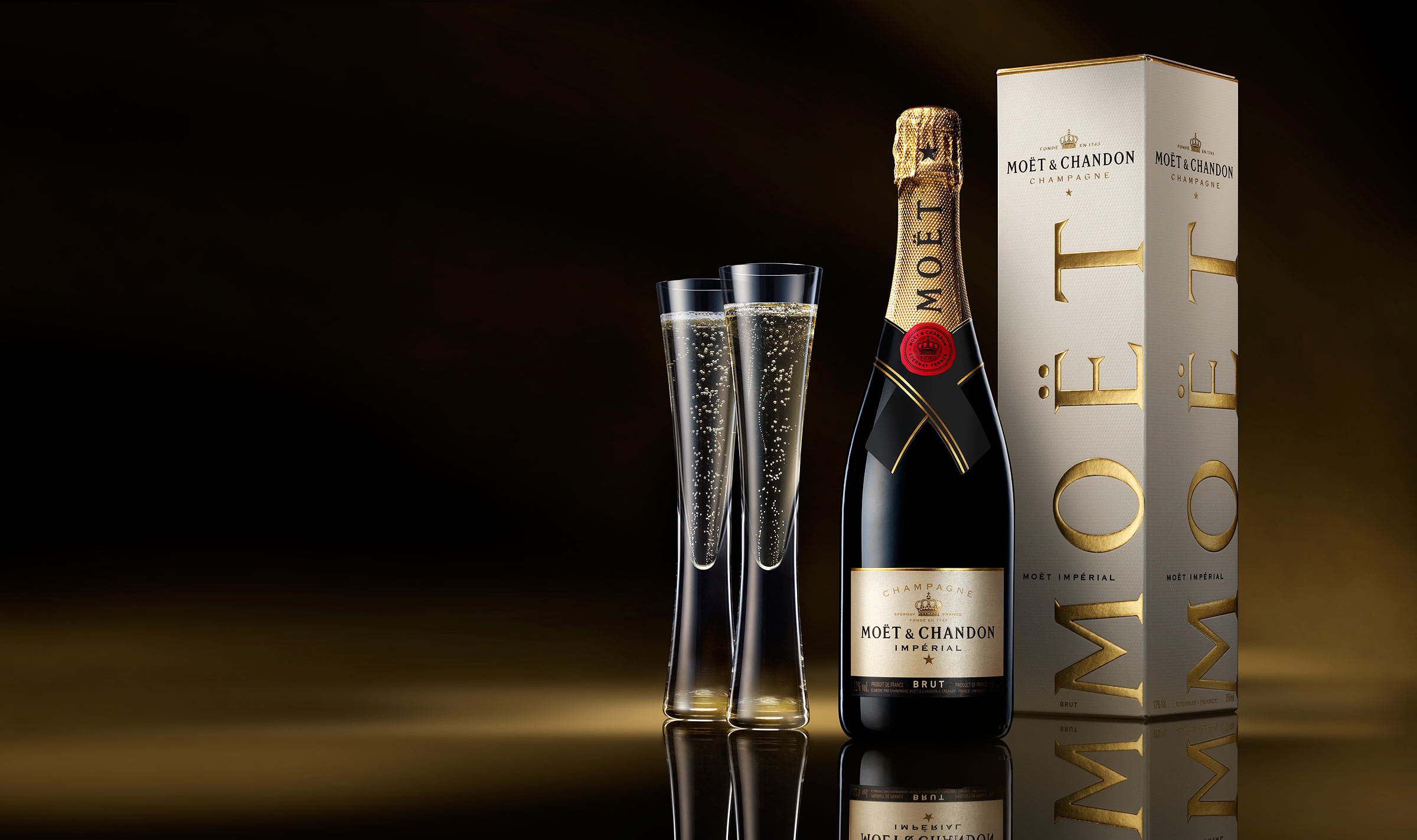 Moet & Chandon Champagne bottle with packaging shot in his London studio by award winning photographer Warren Rytley