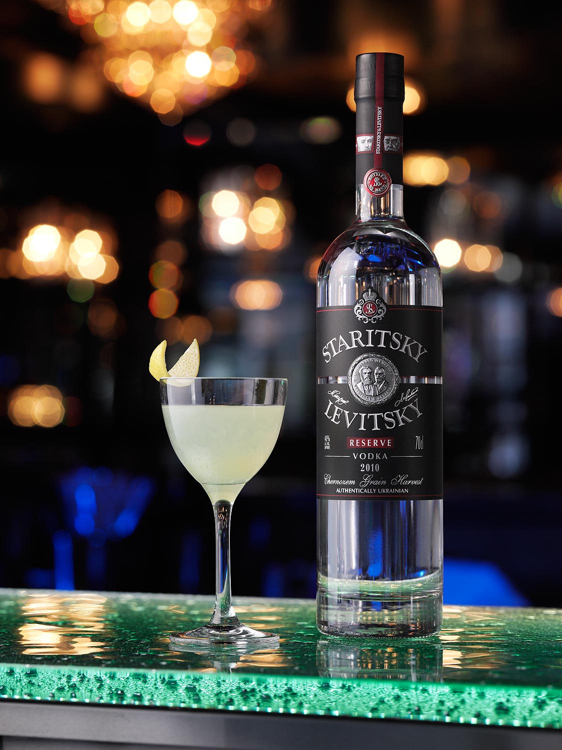 Premium vodka bottle with serve photography created on location in London