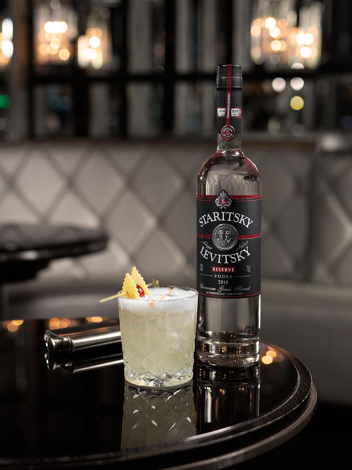 Vodka bottle with serve photography created on location in London by drinks photographer Warren Ryley